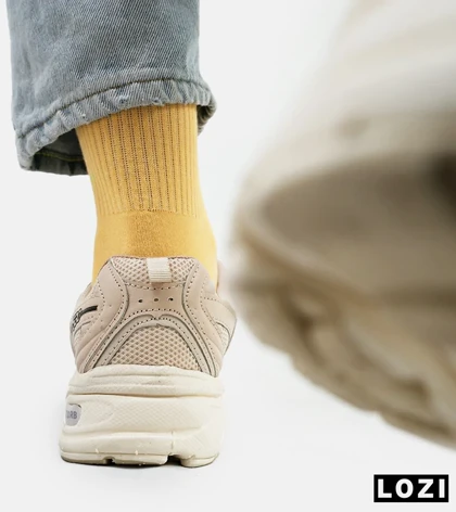 کفش کتانی مردانه و زنانه کرم NEW BALANCE 530