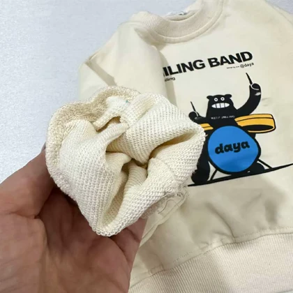 بلوز دورس کرم SMILING BAND طرح هیولا