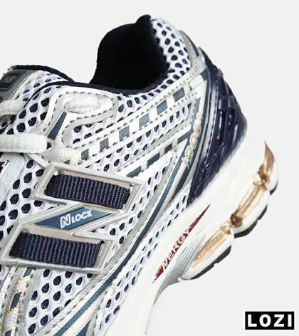 کفش کتانی مردانه و زنانه سفید سرمه ای NEW BALANCE 1064 مدل 8150