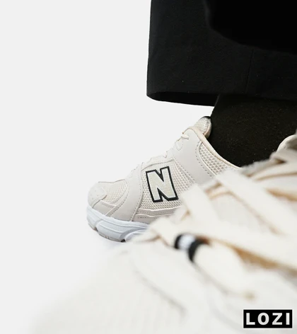 کفش کتانی مردانه و زنانه کرم NEW BALANCE 530