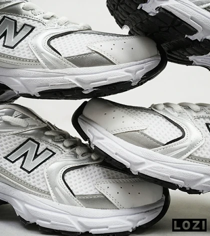 کفش کتانی بزرگپا سفید نقره ای NEW BALANCE 530