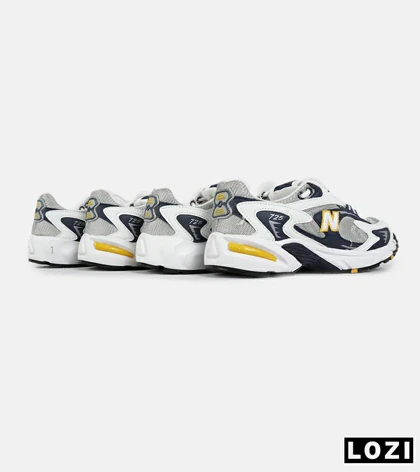 کفش کتانی مردانه و زنانه طوسی زرد مشکی NEW BALANCE 725