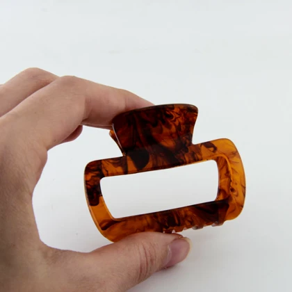 کلیپس زنانه مدل رزینی کاراملی