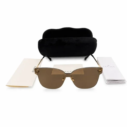 عینک آفتابی زنانه Gucci Rimless با فریم طلایی