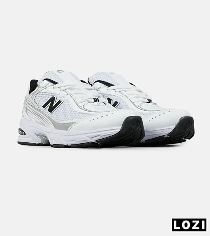 کفش کتانی مردانه و زنانه سفید New Balance 509 مدل 7522