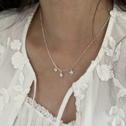 گردنبند صدف و ستاره دریایی تیتانیوم