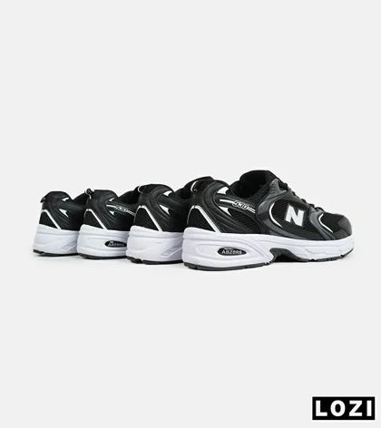 کفش کتانی زنانه و مردانه مشکی سفید NEW BALANCE 530 مدل 6626