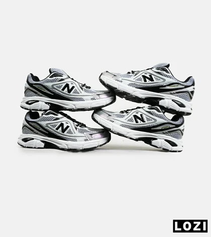 کفش کتانی مردانه و زنانه طوسی مشکی سفید NEW BALANCE 1064 V.2