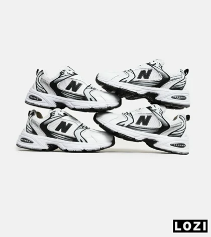 کفش کتانی مردانه و زنانه سفید طوسی مشکی NEW BALANCE 530