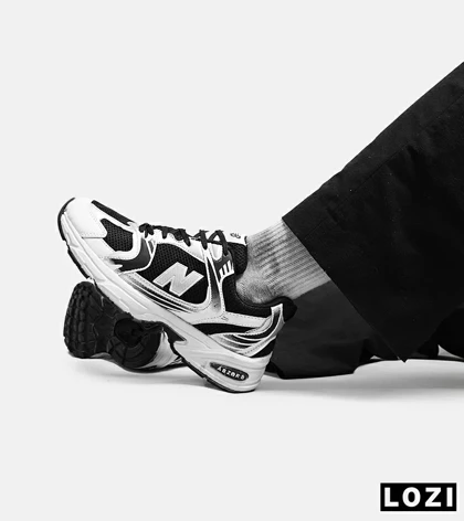 کفش کتانی مردانه و زنانه مشکی سفید NEW BALANCE 530