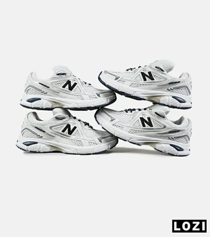 کفش کتانی مردانه و زنانه سفید مشکی NEW BALANCE 1064 V.2