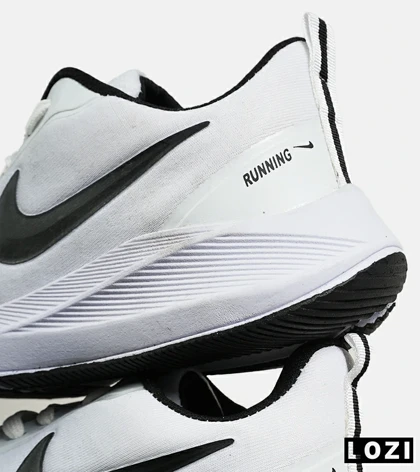 کفش کتانی مردانه و زنانه سفید مشکی Nike guide 10