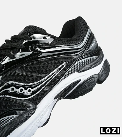 کفش کتانی مردانه و زنانه مشکی سفید Saucony pro grid omni 9 مدل 8648