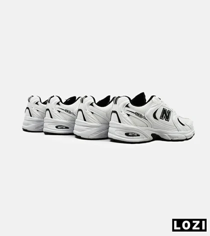 کفش کتانی مردانه و زنانه سفید مشکی NEW BALANCE 530 مدل 4974