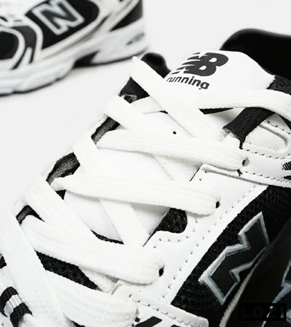 کفش کتانی مردانه و زنانه سفید مشکی NEW BALANCE 530