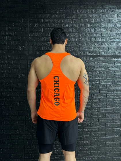 پکیج کد S978 شامل رکابی + شلوارک کشاله دار با تم نارنجی مشکی