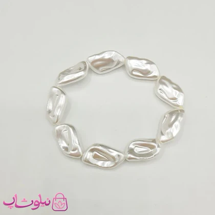 دستبند کشی زنانه دستساز برند N&SH مدل مروارید دفرمه سفید