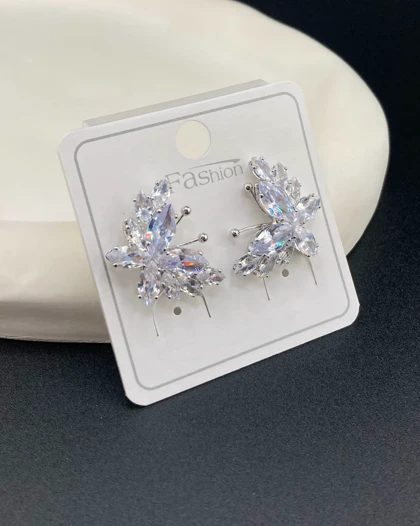 گوشواره جواهری پر کار کد gnj10011 گالری موژان حیدری