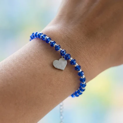 دستبند دخترانه فانتزی مدل صدفی طرح پرتوعشق