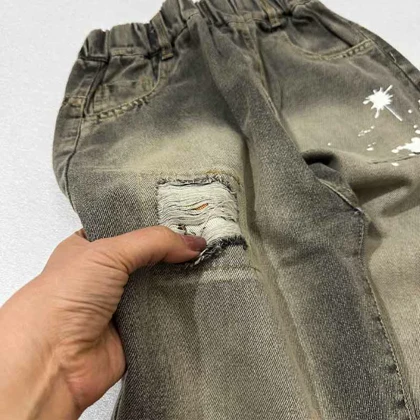 شلوار جین مام زاپ‌دار پشت جیب خرسی