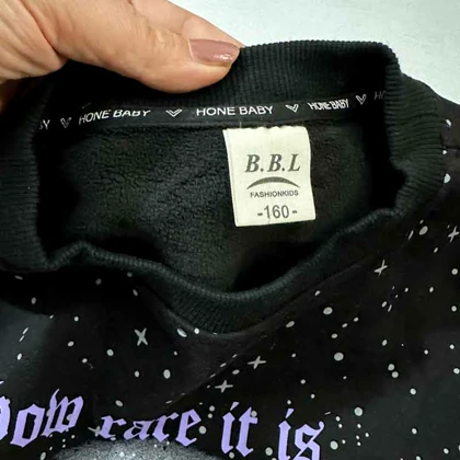 بلوز دورس وارداتی لاینردار کهکشان ستاره دار مشکی