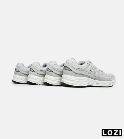 کفش کتانی بزرگ پا طوسی NEW BALANCE 2002R