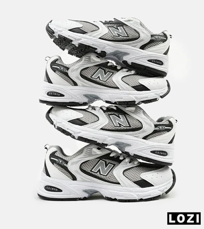 کفش کتانی مردانه و زنانه سفید خاکستری NEW BALANCE 530 مدل 4073
