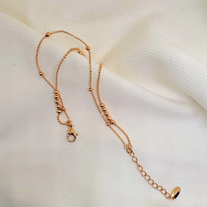 دستبند ژوپینگ مدل «البرنادو» (دوریکا) | رقص گوی‌های طلایی دور مچ