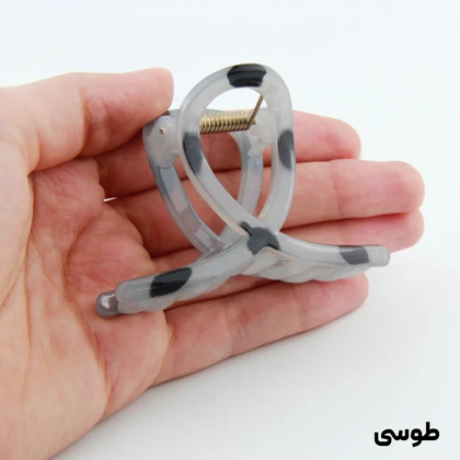 کلیپس دخترانه مدل پیچی خال‌خالی کوچک
