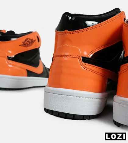 کفش کتانی مردانه و زنانه ساق‌دار مشکی نارنجی ورنی NIKE jordan 1