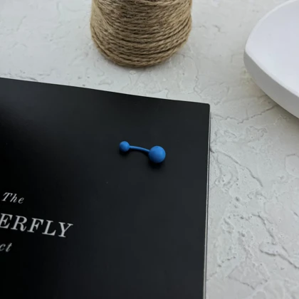 پیرسینگ ناف استیل با طراحی توپی مینیمال