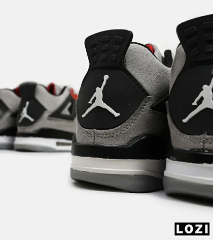 کتانی ساق‌دار بزرگ پا طوسی مشکی قرمز Nike air jordan 4