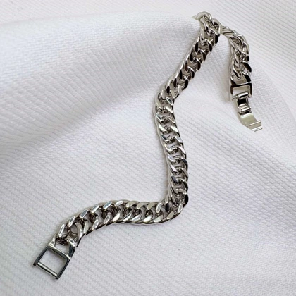 دستبند ژوپینگ طرح کارتیه (کوبان) نقره‌ای با قفل کتابی | یونیسکس