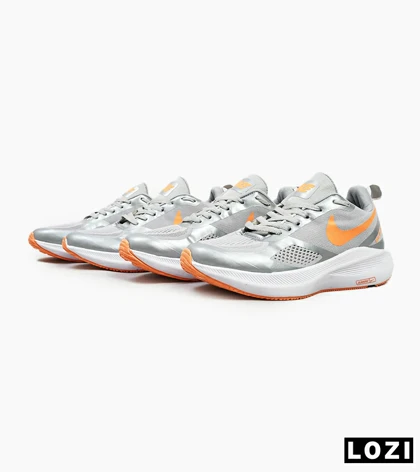 کفش کتانی مردانه طوسی نارنجی Nike guide 10