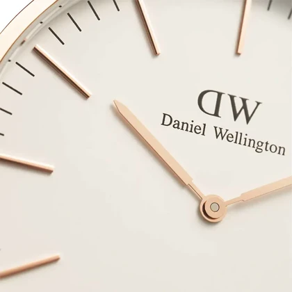 ساعت دنیل ولینگتون مردانه رزگلد بند چرم زرشکی DW-4692-G