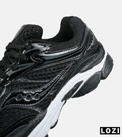 کفش کتانی مردانه و زنانه مشکی سفید Saucony pro grid omni 9 مدل 8640