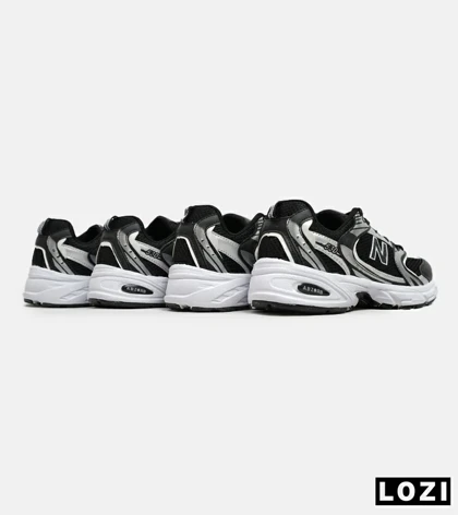 کفش کتانی مردانه و زنانه مشکی نقره ای NEW BALANCE 530