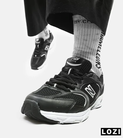 کفش کتانی زنانه و مردانه مشکی سفید NEW BALANCE 530