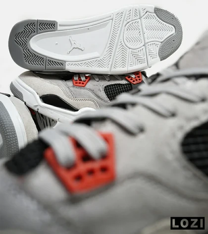 کتانی ساق‌دار بزرگ پا طوسی مشکی قرمز Nike air jordan 4