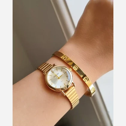 ساعت مچی زنانه کوشی شیشه الماسی بند استیل ریلیباتری اضافی