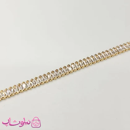 دستبند زنانه تنیسی طلایی نگین باگتی سفید باریک عرض 3 میل کد 450