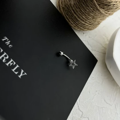 پیرسینگ ناف ستاره جواهری استیل - درخشش بی‌انتها