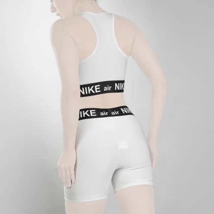 ست نیم‌تنه و کشاله بند ورزشی زنانه نایک مدل VHD-3E792 سفید