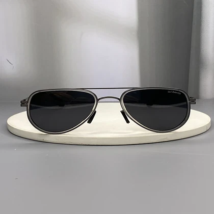 عینک آفتابی آیس‌برلین با فریم تیتانیوم و لنز پلی‌کربنات پلاریزه UV400 انعطاف‌پذیر و نشکن