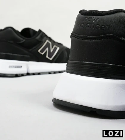 کفش کتانی مردانه و زنانه مشکی سفید NEW BALANCE 1300