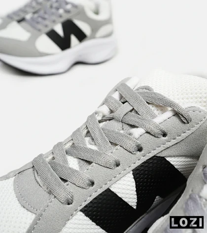 کفش کتانی مردانه سفید طوسی مشکی NEW BALANCE 547