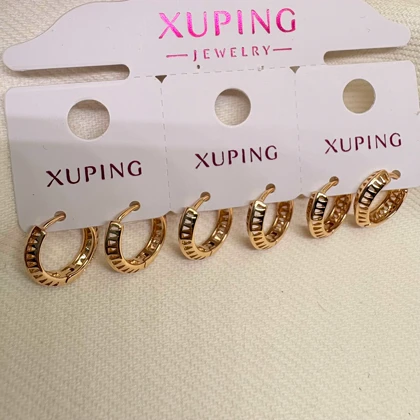 گوشواره حلقه‌ای ژوپینگ طرح «تراش هندسی» | بازی نور و سایه روی طلا