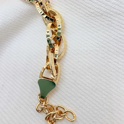 دستبند برند شین مدل «بیضی زرین» | با آبکاری طلای 24 عیار و تراش‌های درخشان