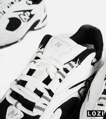 کفش کتانی مردانه و زنانه سفید مشکی NEW BALANCE 725
