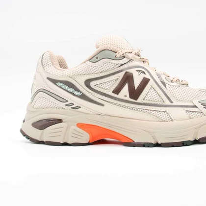 کتانی نیوبالانس 1064 کرم نارنجی کد 5454